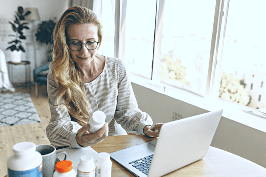Menopause Woman Looking at Supplement Facts