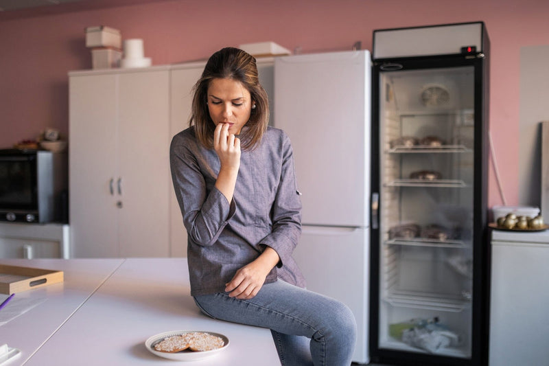 Menopause woman smelling cookie