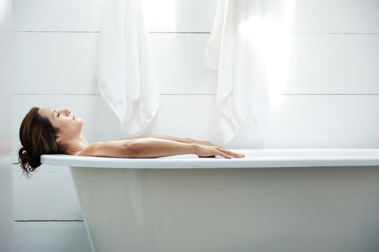 Woman in perimenopause in bathtub 