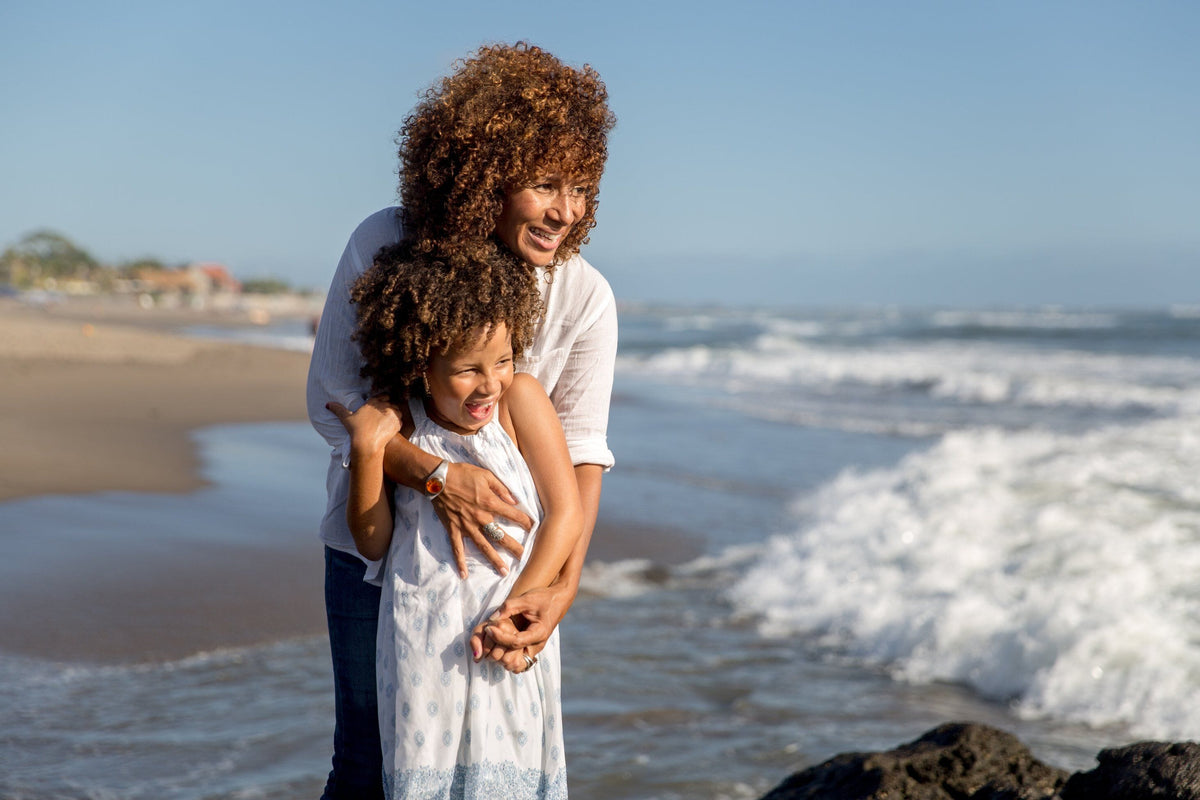 Woman and child at beach