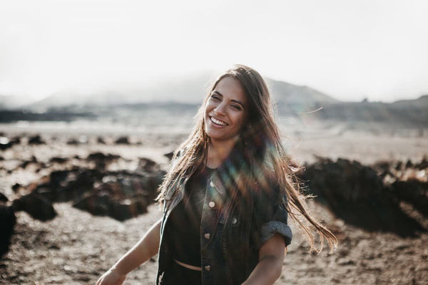 Woman smiling on a beach