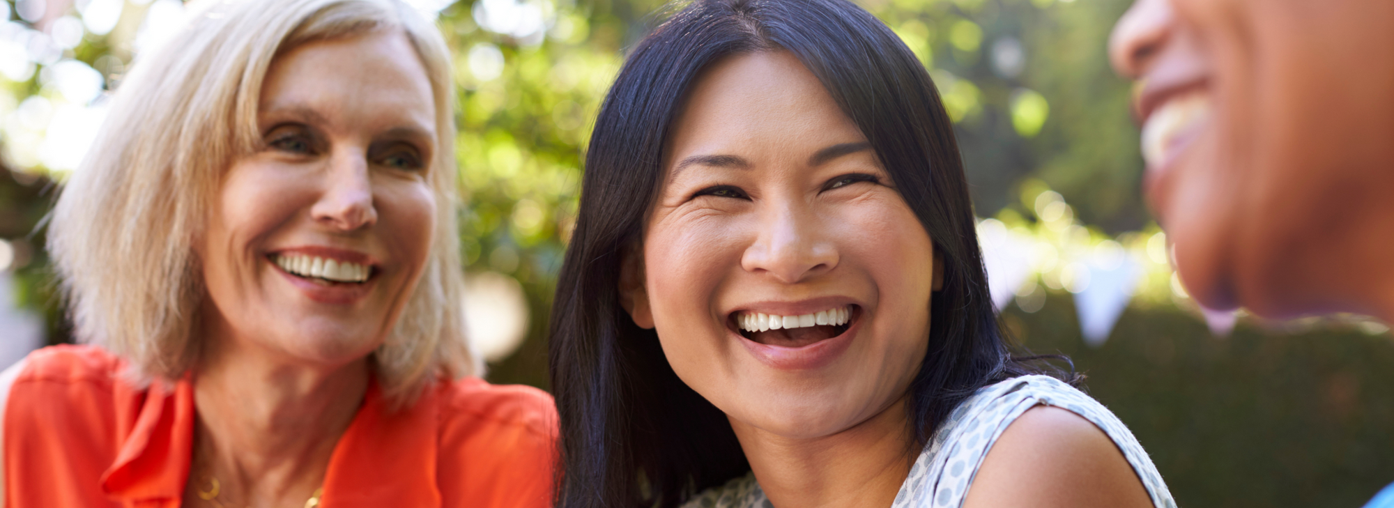 Women smiling together